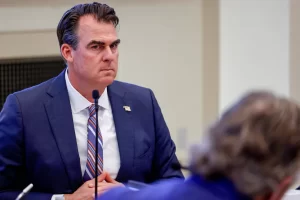 Oklahoma Gov. Kevin Stitt attends a budgetary meeting earlier this year at the state Capitol.